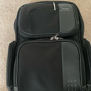 Tumi leather and ballistic nylon backpack